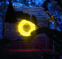 Yellow Neon in the garden as sculpture