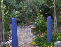 Recycled concrete house posts used at the garden entrance